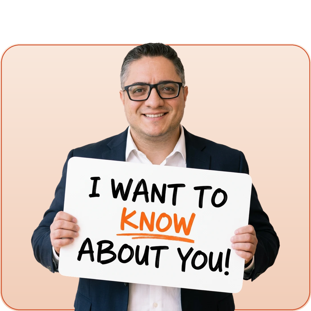 Tony Tovar holding a sign that reads: I want to KNOW about you!